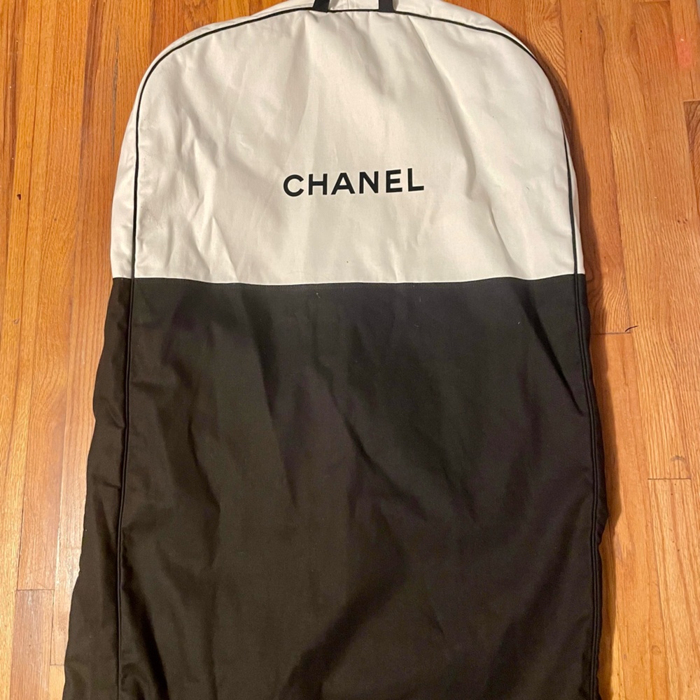 Chanel Garment Bag made of linen/cotton fabric and it folds by snaps